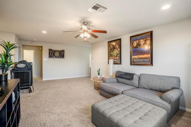 The large upstairs gameroom, which is the perfect relaxing spot. | Image 36