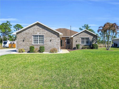 908 Pine Ave, Lehigh Acres, FL, 33972-8307 | Card Image