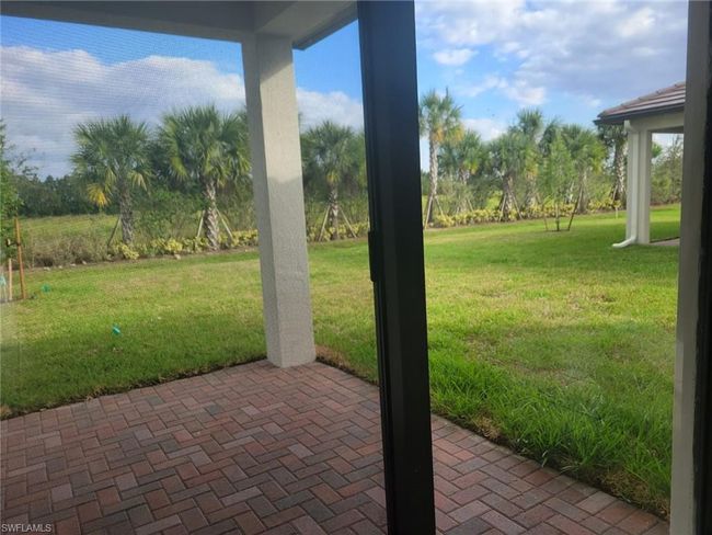 View of patio with view of scattered trees | Image 26