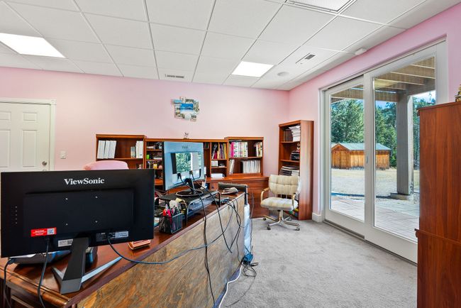 Lower level guest bedroom #2 - access to patio | Image 37