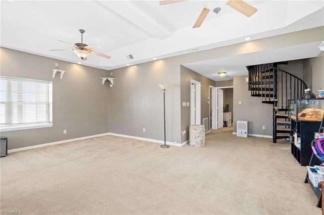 Finished lower level basement that has great natural lighting & freshly painted | Image 31