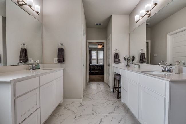 Ensuite primary bathroom with separate vanities | Image 13