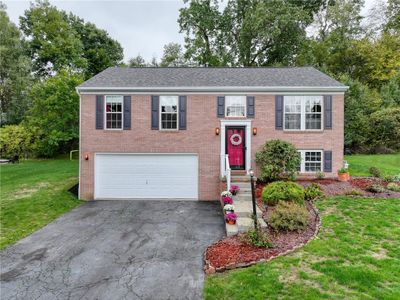 Welcome to beautifully updated 1111 Fairfield Lane in the Pointe West community/North Fayette Township/West Allegheny Schools (McKee Elementary). You won't believe ALL of the improvements at this stunning property, including a BRAND NEW ROOF and gutter guards. Come on inside! | Image 1