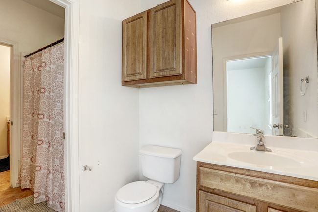 Full bathroom featuring vanity and toilet | Image 14