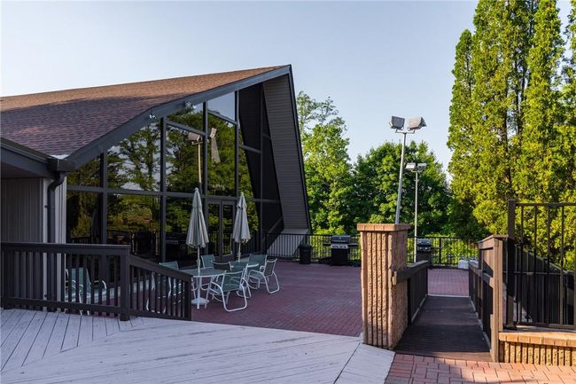 Deck and BBQ area near the pool | Image 14