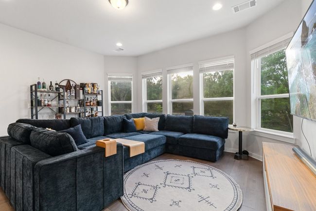 Living room featuring wood finished floors and recessed lighting | Image 26
