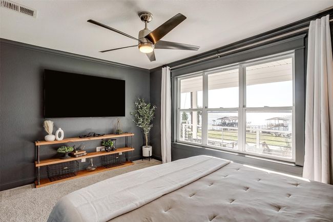 Bedroom featuring baseboards, ornamental molding, and a ceiling fan | Image 20