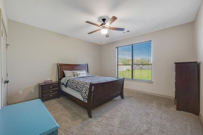 Oversized 4th bedroom has its own designated bathroom and sits away from the other rooms. Perfect for guest, older children or in-laws | Image 27