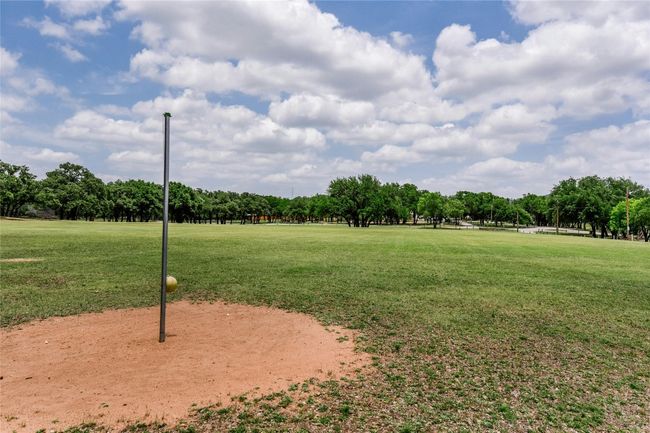 View of home's community featuring a lawn | Image 6