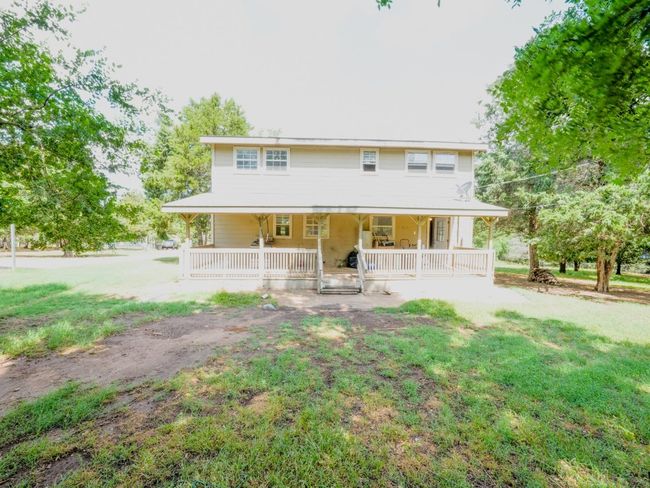 View of front of home with a porch and a front yard | Image 24