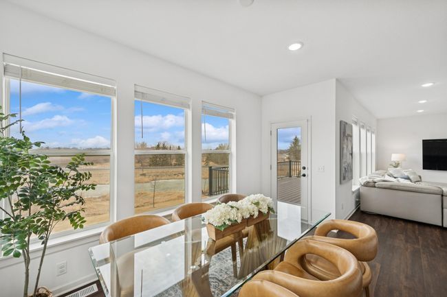 Enjoy the nature view from the dining room. | Image 14