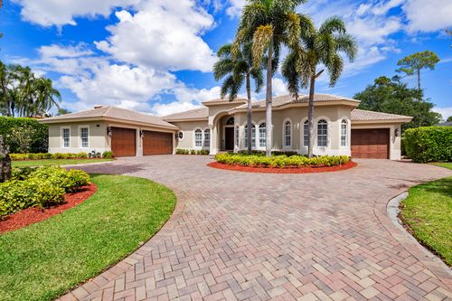 594 N Country Club Dr, Atlantis, FL, 33462-1035 | Card Image