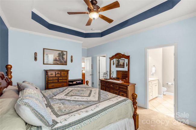 Primary bedroom with trey ceiling | Image 15