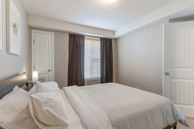 104 - 90 Panatella Landing Nw, Home with 2 bedrooms, 1 bathrooms and 1 parking in Calgary AB | Image 19