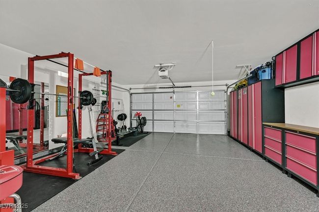 Garage with a garage door opener | Image 6