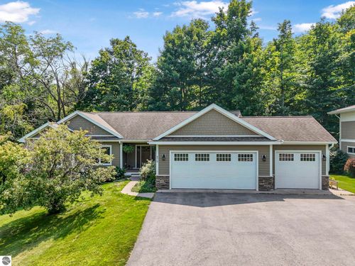 876 Incochee Woods Dr, Traverse City, MI, 49684-1490 | Card Image