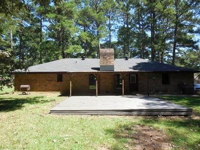 Back of property featuring a yard and a deck | Image 3