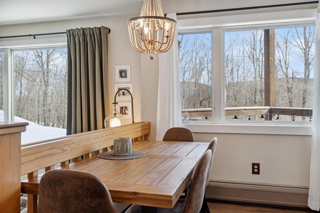 Enjoy a meal with a view outside, or step out and have a seat on your private deck outside the window. | Image 5