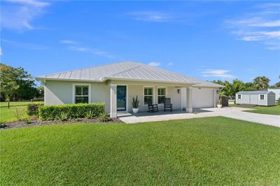 5740 Se Ault Avenue, House other with 4 bedrooms, 2 bathrooms and 2 parking in Stuart FL | Image 3