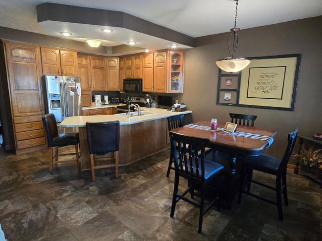Eat in kitchen plus dining bar! | Image 4