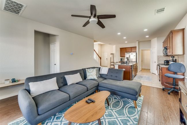 From the family living area, the open floor-plan is once again an appreciated touch! | Image 6