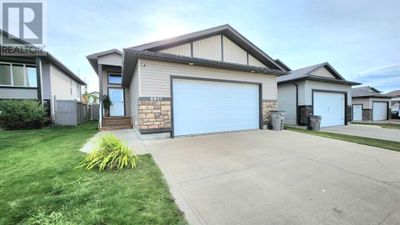 6917 115 A St, House other with 4 bedrooms, 2 bathrooms and 2 parking in Grande Prairie AB | Image 1