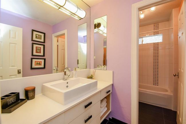 The third updated bathroom is fun and large. Making it a great shared space. | Image 41