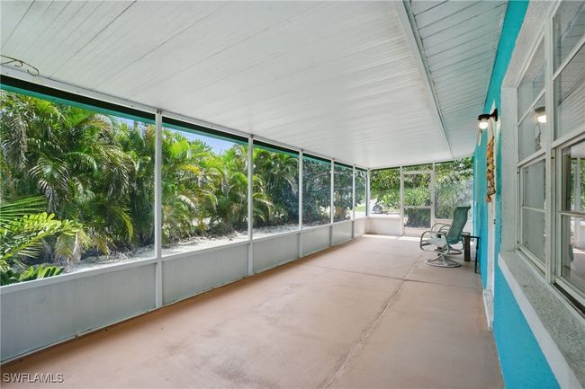 View of unfurnished sunroom | Image 13