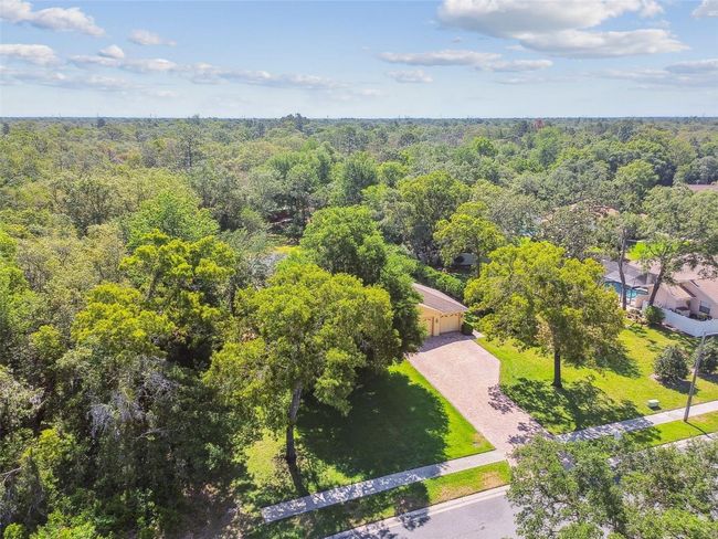 18502 Winding Oaks Blvd, House other with 4 bedrooms, 3 bathrooms and null parking in Hudson FL | Image 74