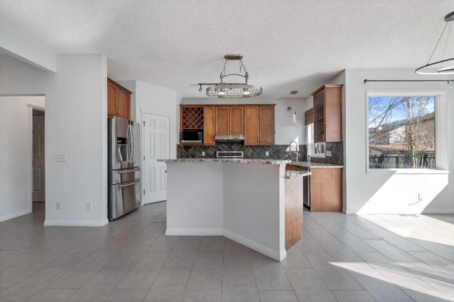 213 West Creek Drive, Home with 4 bedrooms, 3 bathrooms and 4 parking in Chestermere AB | Image 10