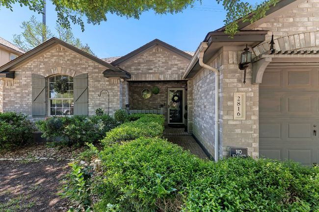 View of front of house with a front entry garage | Image 36