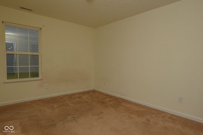 spare room featuring carpet floors and baseboards | Image 10