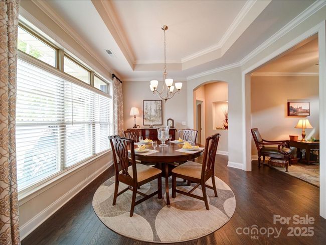 Dining Area overlooks the landscaped courtyard | Image 10