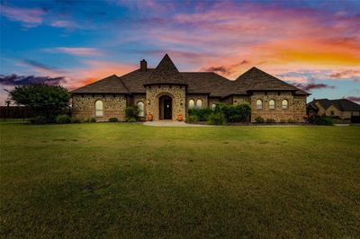 French country home with a lawn | Image 1