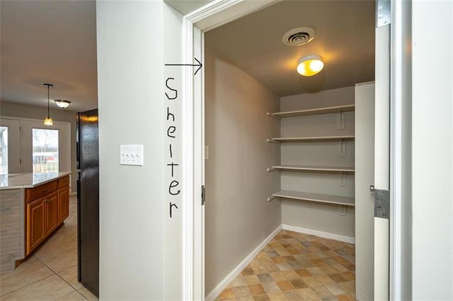 Pantry featuring visible vents | Image 11
