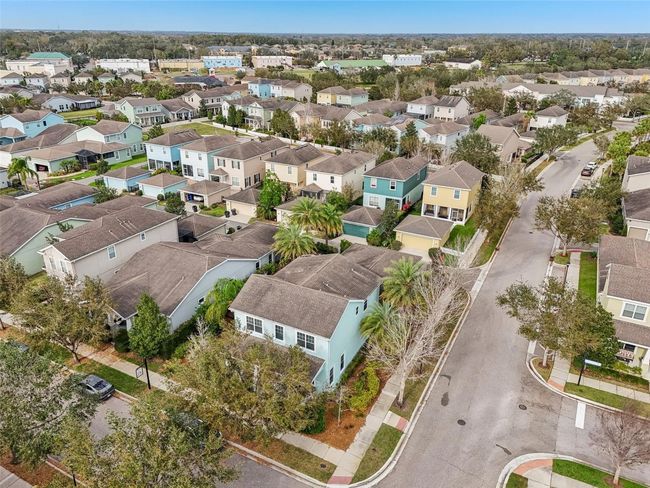 LARGE CORNER LOT ADDS EASY PARKING AND ACCESS! | Image 57