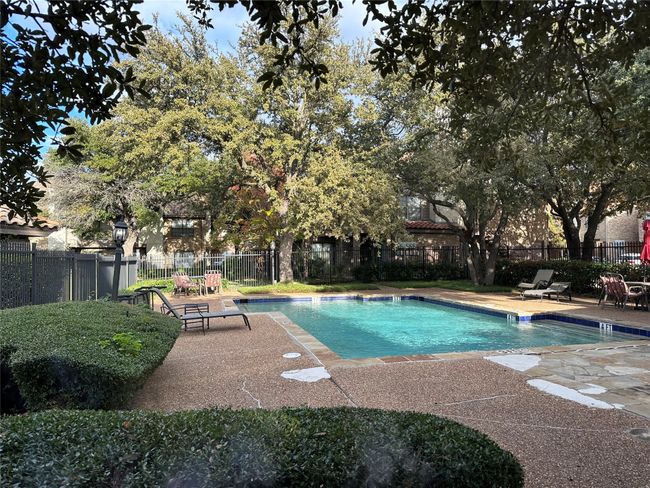 Community pool with a patio | Image 18