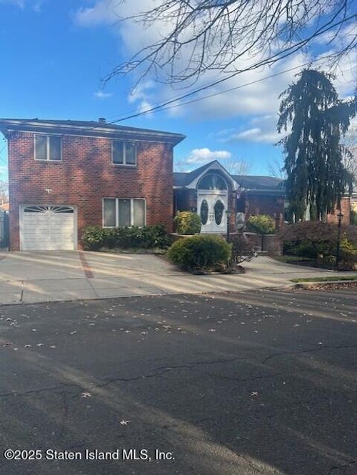 1061 Woodhull Ave, Staten Island, NY, 10312-3925 | Card Image