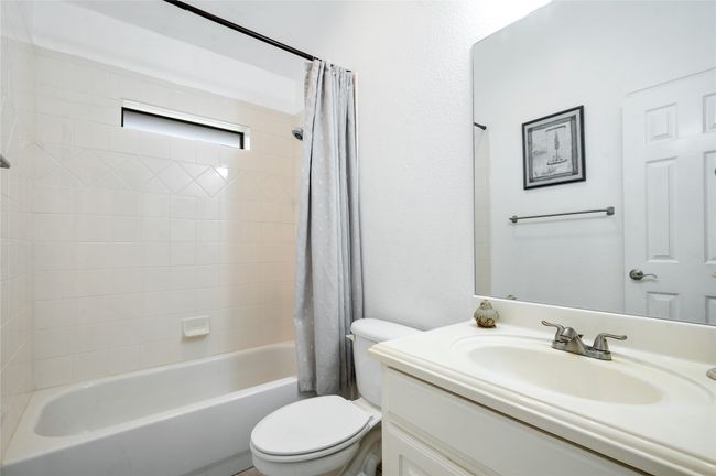 Full bath with vanity and shower / tub combo with curtain | Image 28