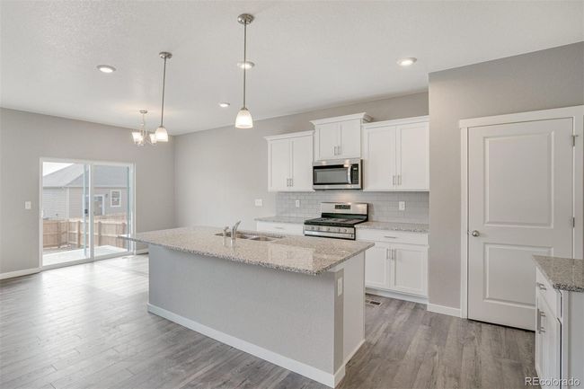 7702 E 159 Th Ave, House other with 5 bedrooms, 3 bathrooms and 3 parking in Thornton CO | Image 13