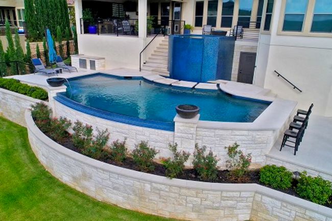 Backyard Pool Rendering – Conceptual view of the swimming pool, showcasing integrated steps and a designed patio area (for visualization purposes only) | Image 37