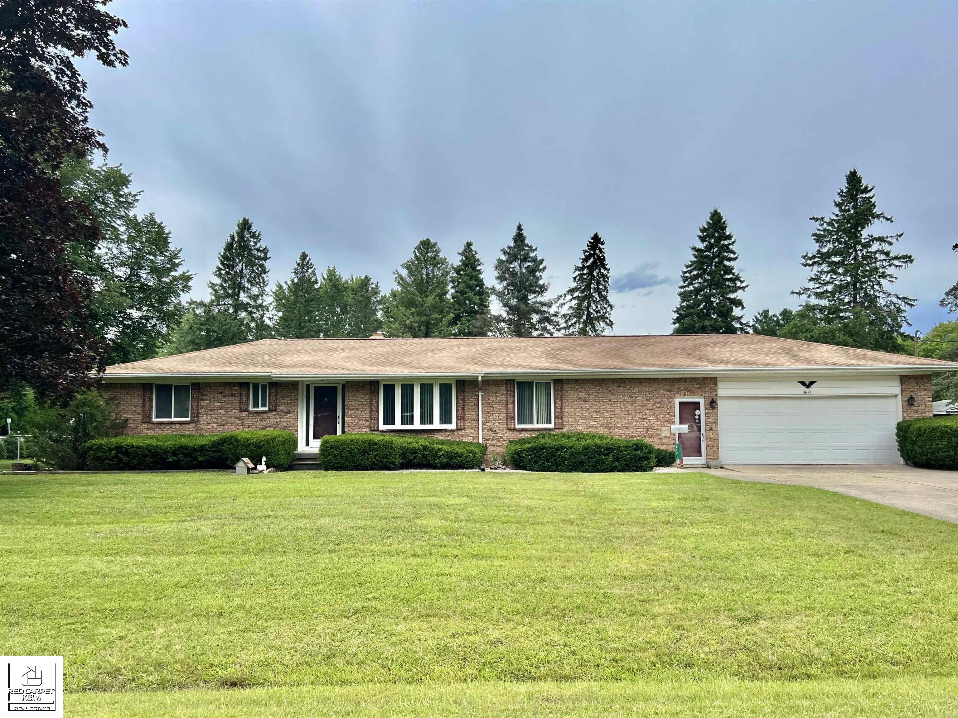 Hugh St, Burton, MI 48509