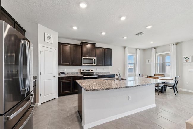 9804 Rowing Dale Bnd, House other with 4 bedrooms, 3 bathrooms and null parking in WESLEY CHAPEL FL | Image 10