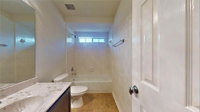 Cozy third guest bathroom located upstairs, featuring modern fixtures and a clean design. | Image 37