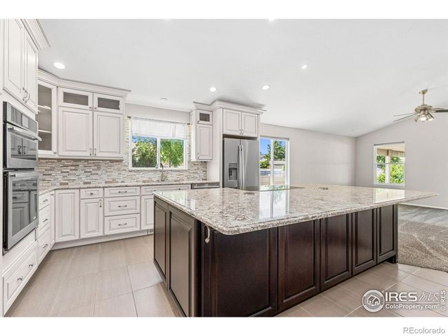 10185 Ferncrest St, House other with 5 bedrooms, 3 bathrooms and 3 parking in Firestone CO | Image 9