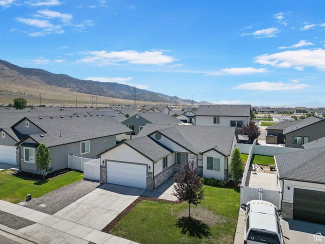 Aerial perspective of suburban area featuring a mountainous background | Image 29