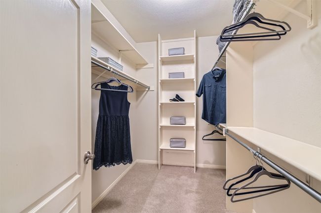 Primary bedroom walk in closet, customized | Image 21