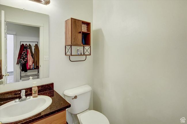 Half bath with toilet and vanity | Image 25
