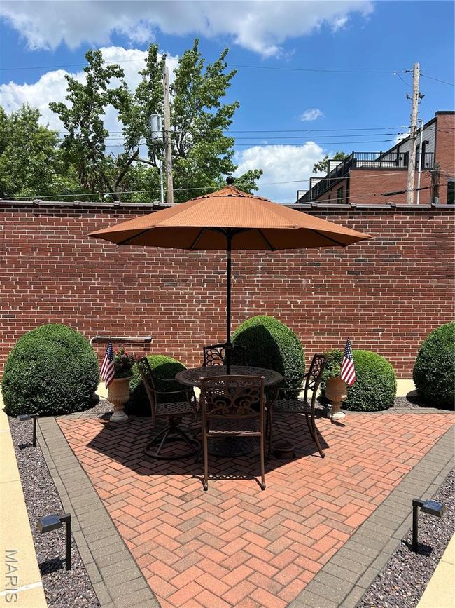 View of patio featuring outdoor dining space | Image 6