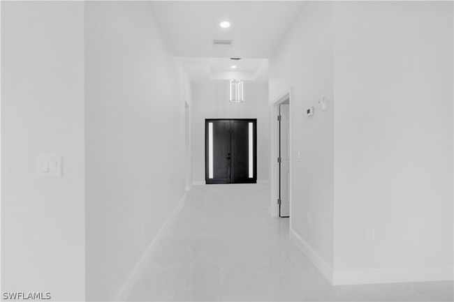 Hall with tile floors | Image 25